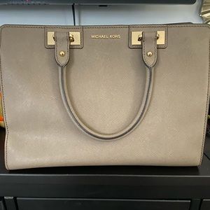 Michael Kors satchel bag. Gray tan color